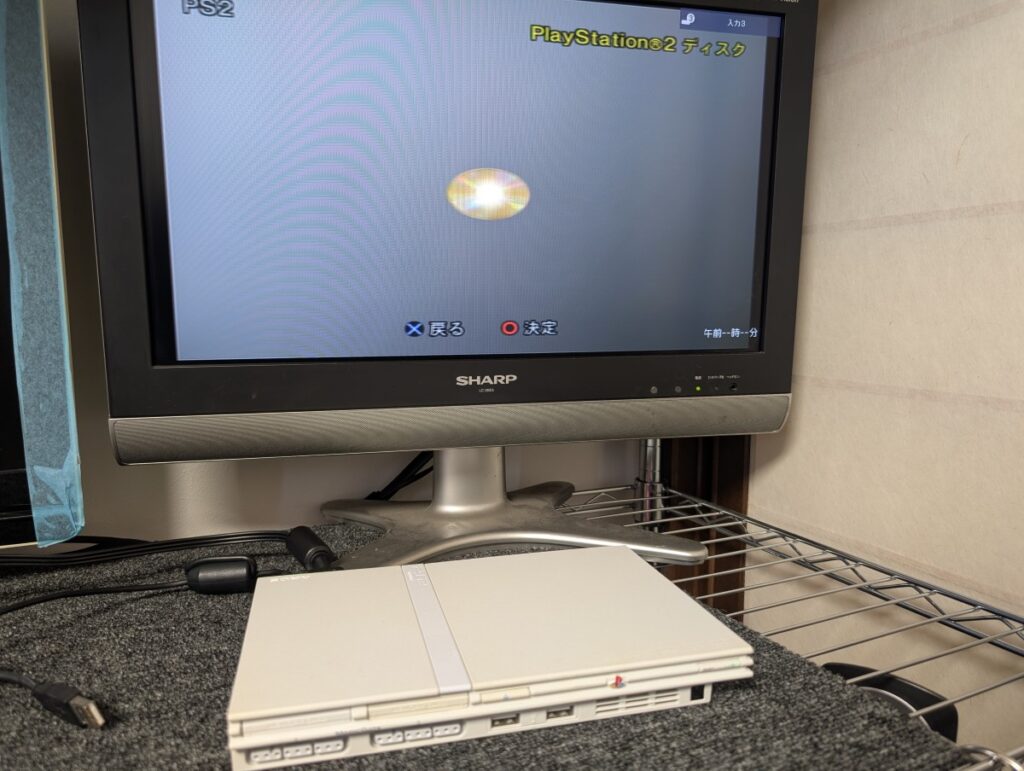 SCPH-77000のピックアップレンズ交換後の動作確認時の様子
DVD規格ディスク読み込み成功時の写真
