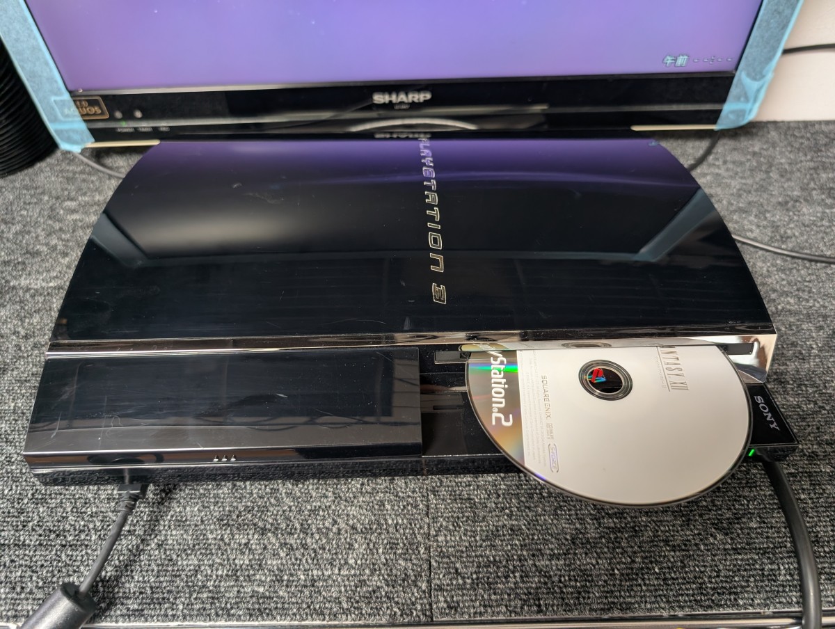 CECHA00本体とPS2規格ディスクの写真