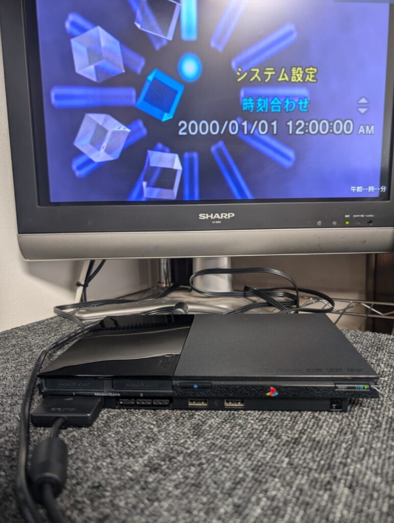 SCPH-90000本体とテレビ画面
時刻設定画面